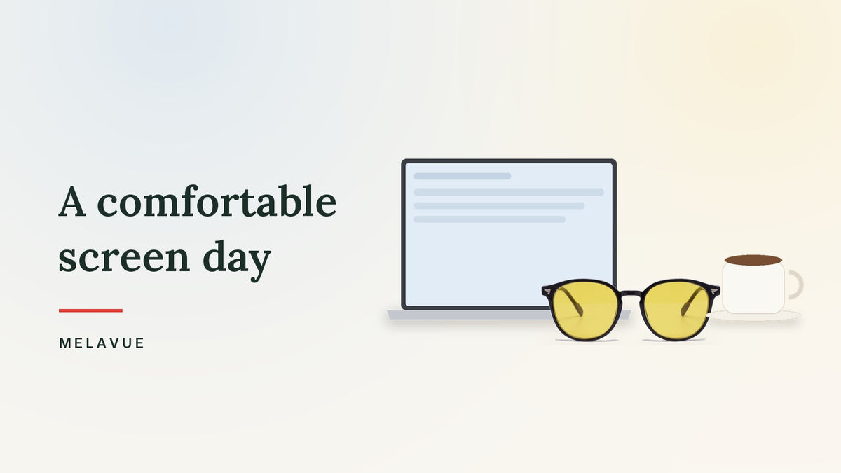 Melavue DayLight yellow lens glasses beside a laptop and a coffee cup on a cream desk