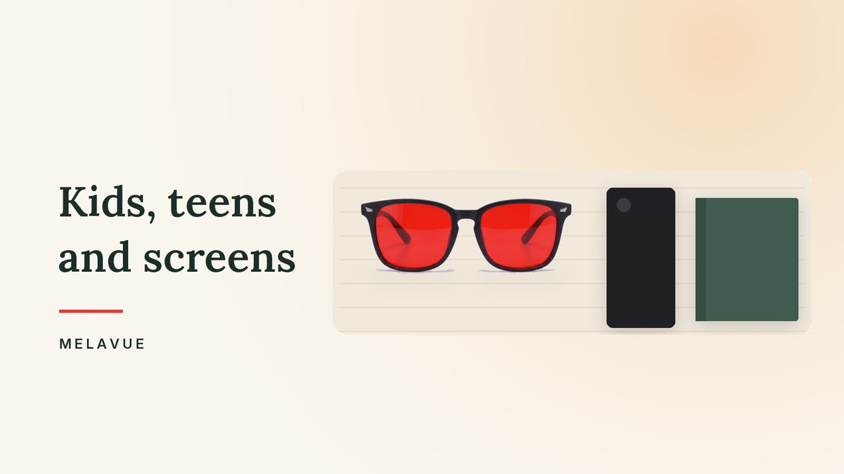 Melavue Midnight red lens glasses folded on a cream bedspread beside a phone face down and a closed book