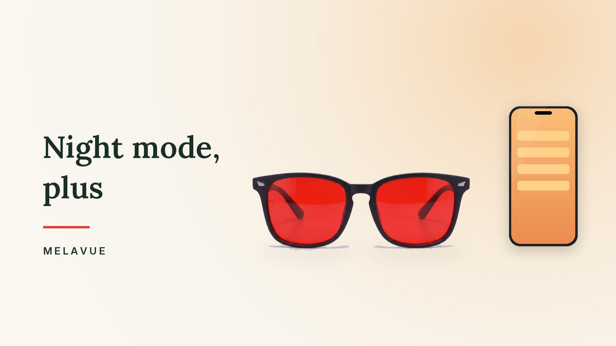 Melavue Midnight red lens glasses resting beside a phone with a warm-toned screen on a cream surface